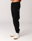 Russell Athletic Australia Men's R Logo Trackpants - Black True Since 1902