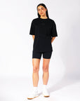 Russell Athletic Australia Women's Oversized Tonal Logo  Black Tee | Russell Athletic True Since 1902