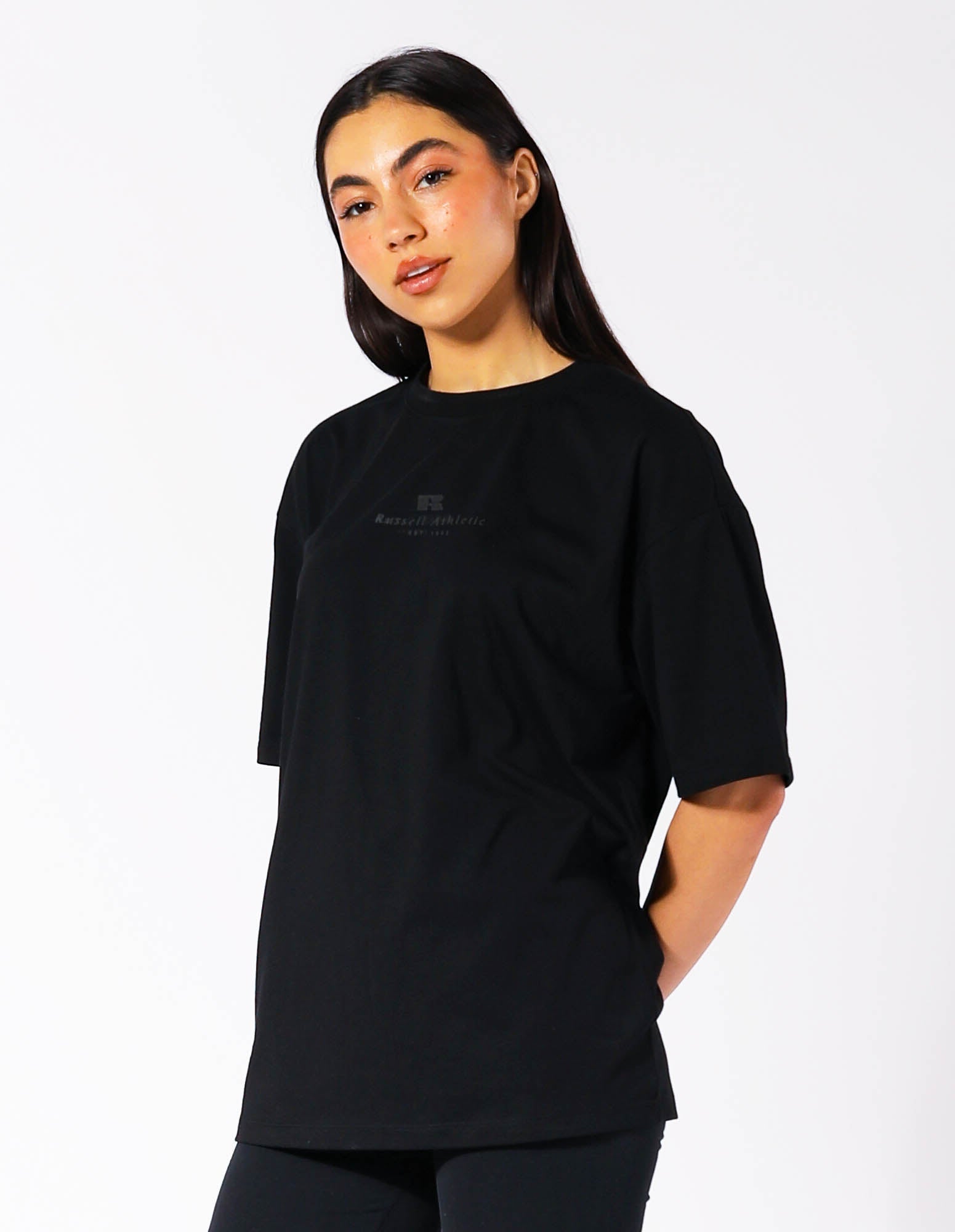 Russell Athletic Australia Women's Oversized Tonal Logo  Black Tee | Russell Athletic True Since 1902