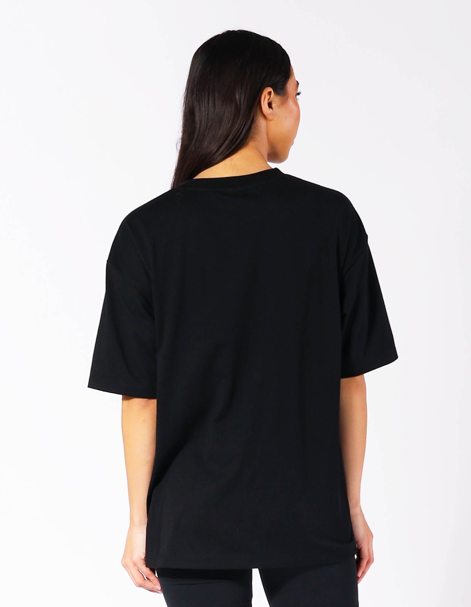 Russell Athletic Australia Women's Oversized Tonal Logo  Black Tee | Russell Athletic True Since 1902