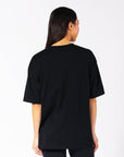 Russell Athletic Australia Women's Oversized Tonal Logo  Black Tee | Russell Athletic True Since 1902